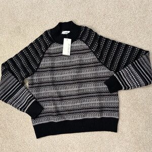 Women’s black and gray fair isle style sweater